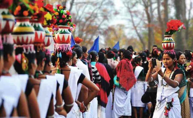 Chitwan-tour-with-Tharu-people-768×469